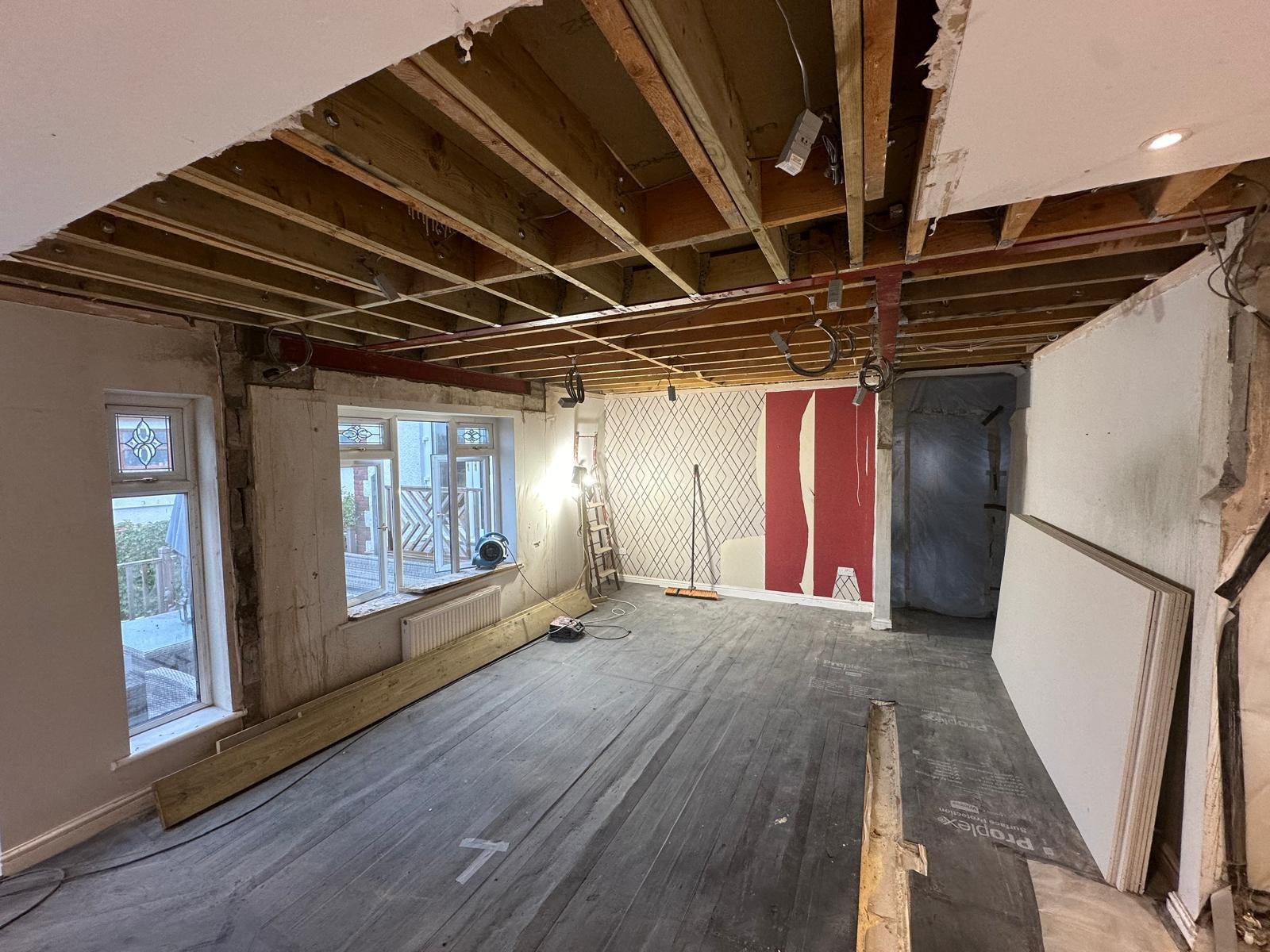 The last owner knocked through without building regs. What now?